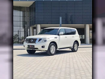 Nissan  Patrol  SE  2015  Automatic  274,000 Km  8 Cylinder  Four Wheel Drive (4WD)  SUV  White