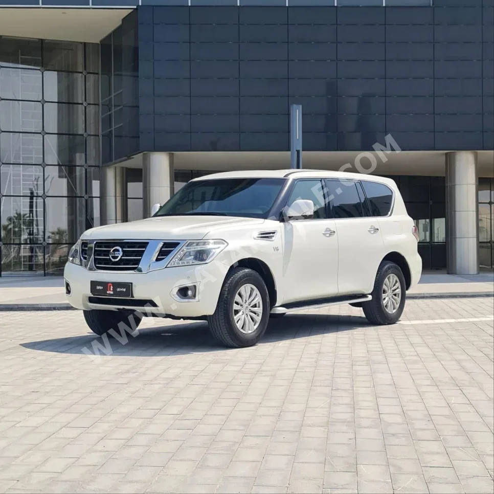 Nissan  Patrol  SE  2015  Automatic  274,000 Km  8 Cylinder  Four Wheel Drive (4WD)  SUV  White