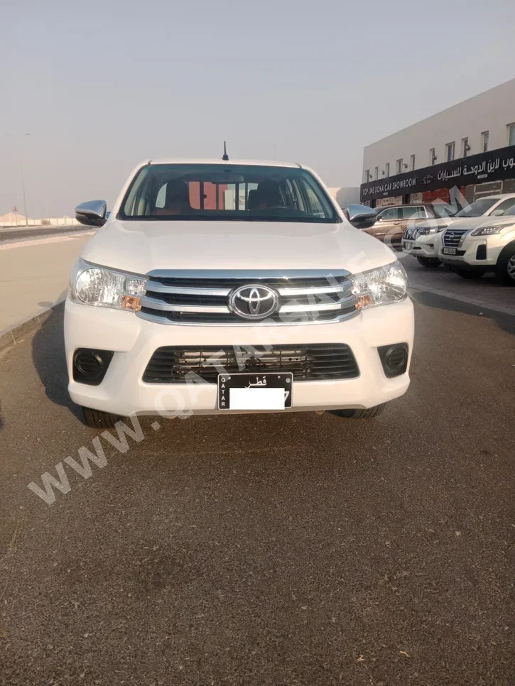 Toyota  Hilux  2021  Manual  13,000 Km  4 Cylinder  Four Wheel Drive (4WD)  Pick Up  White