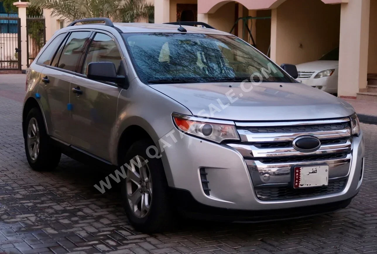 Ford  Edge  SE  2013  Automatic  133,000 Km  6 Cylinder  All Wheel Drive (AWD)  SUV  Silver