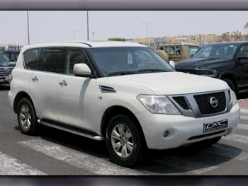 Nissan  Patrol  SE  2013  Automatic  414,000 Km  8 Cylinder  Four Wheel Drive (4WD)  SUV  White