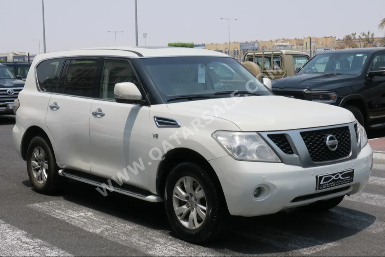 Nissan  Patrol  SE  2013  Automatic  414,000 Km  8 Cylinder  Four Wheel Drive (4WD)  SUV  White