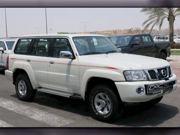 Nissan  Patrol  Safari  2023  Automatic  0 Km  6 Cylinder  Four Wheel Drive (4WD)  SUV  White  With Warranty