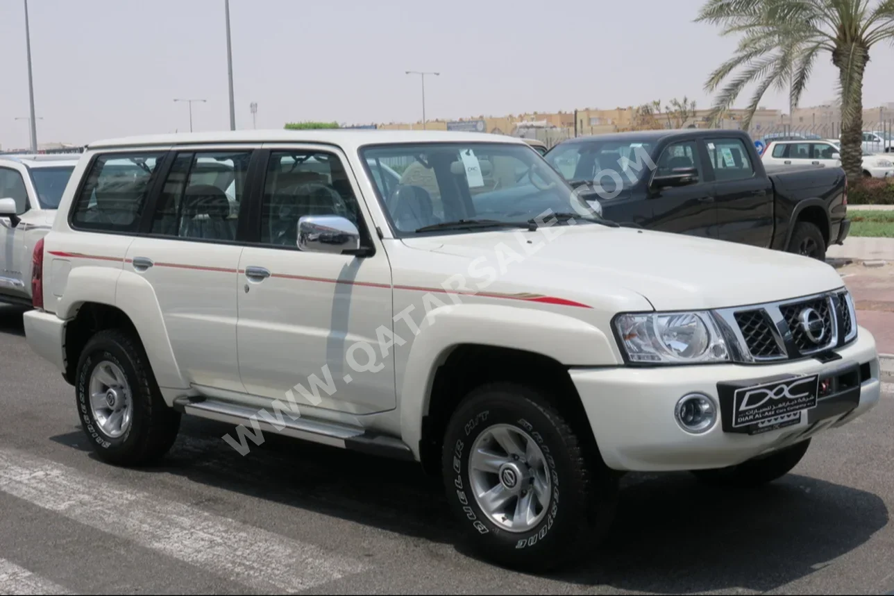 Nissan  Patrol  Safari  2023  Automatic  0 Km  6 Cylinder  Four Wheel Drive (4WD)  SUV  White  With Warranty