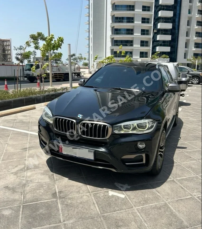 BMW  X-Series  X6 50i  2015  Automatic  140,000 Km  8 Cylinder  All Wheel Drive (AWD)  SUV  Black