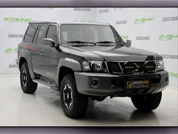 Nissan  Patrol  Super Safari  2022  Automatic  47,000 Km  6 Cylinder  Four Wheel Drive (4WD)  SUV  Black and Gray  With Warranty