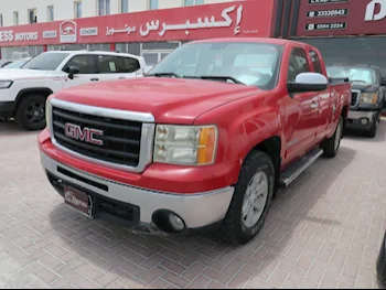 GMC  Sierra  SLE  2009  Automatic  459,000 Km  8 Cylinder  Four Wheel Drive (4WD)  Pick Up  Red