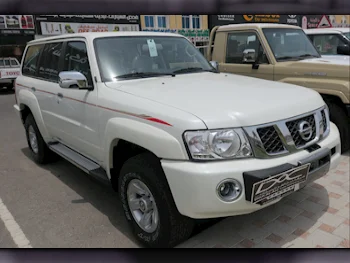 Nissan  Patrol  Safari  2023  Manual  0 Km  6 Cylinder  Four Wheel Drive (4WD)  SUV  White  With Warranty