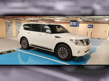 Nissan  Patrol  Platinum  2014  Automatic  297,000 Km  8 Cylinder  Four Wheel Drive (4WD)  SUV  White