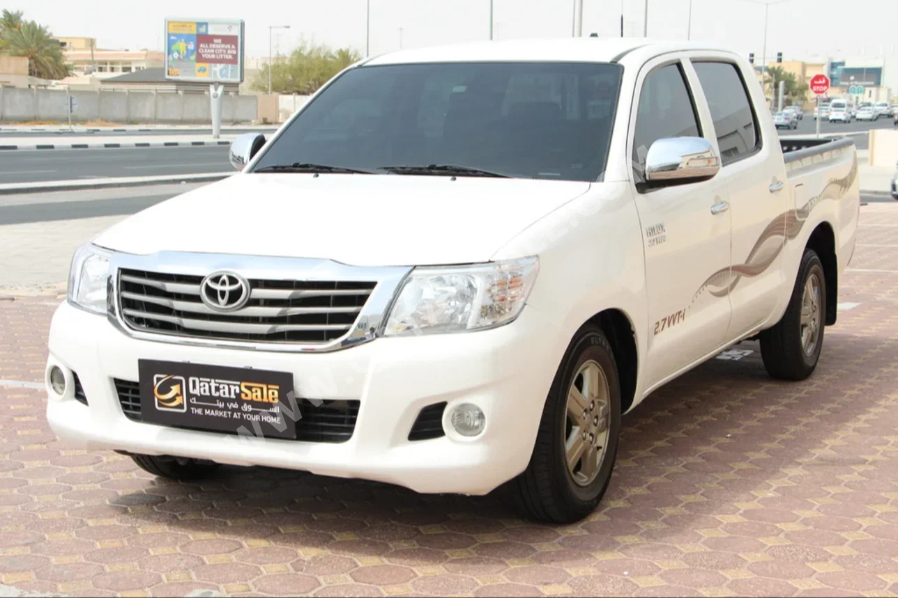 Toyota  Hilux  2013  Manual  154,000 Km  4 Cylinder  Four Wheel Drive (4WD)  Pick Up  White