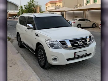 Nissan  Patrol  Platinum  2015  Automatic  198,000 Km  8 Cylinder  Four Wheel Drive (4WD)  SUV  White