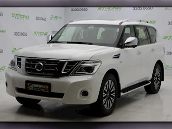 Nissan  Patrol  Platinum  2014  Automatic  327,000 Km  8 Cylinder  Four Wheel Drive (4WD)  SUV  Pearl