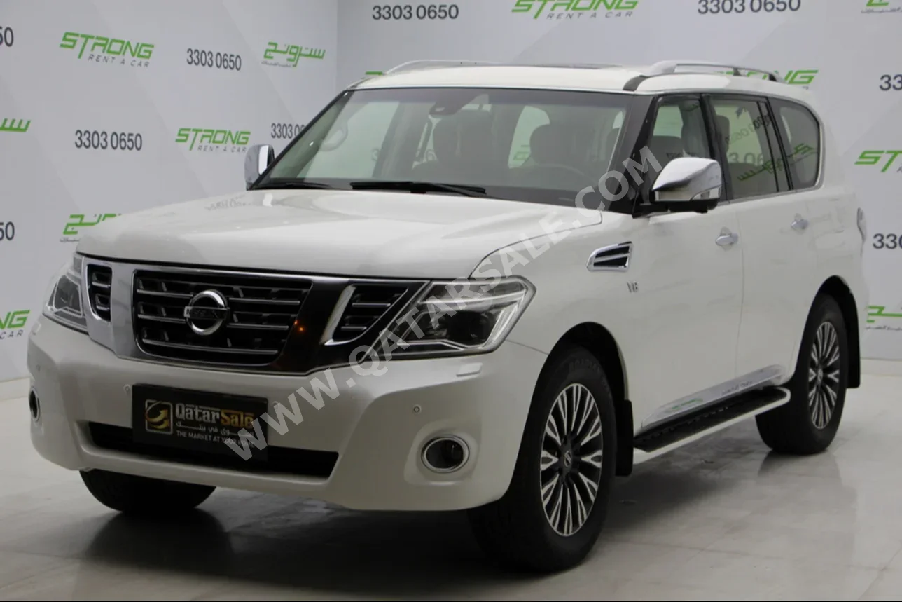 Nissan  Patrol  Platinum  2014  Automatic  327,000 Km  8 Cylinder  Four Wheel Drive (4WD)  SUV  Pearl