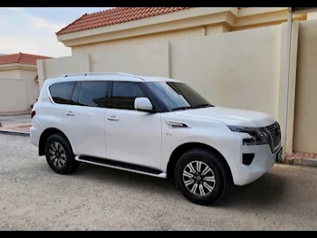 Nissan  Patrol  LE  2023  Automatic  55,000 Km  8 Cylinder  Four Wheel Drive (4WD)  SUV  White  With Warranty