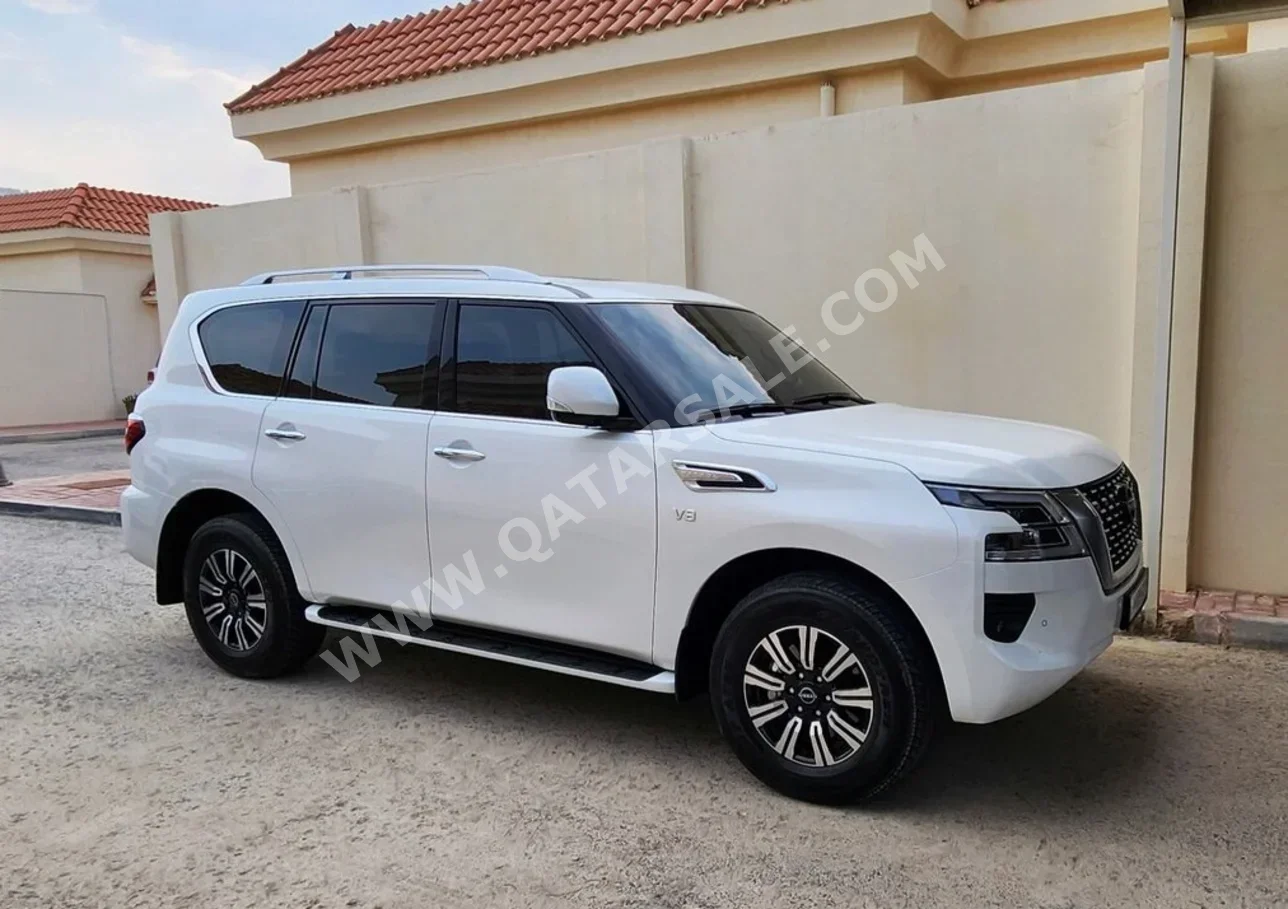 Nissan  Patrol  LE  2023  Automatic  55,000 Km  8 Cylinder  Four Wheel Drive (4WD)  SUV  White  With Warranty