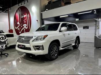  Lexus  LX  570  2014  Automatic  290,000 Km  8 Cylinder  Four Wheel Drive (4WD)  SUV  Pearl  With Warranty