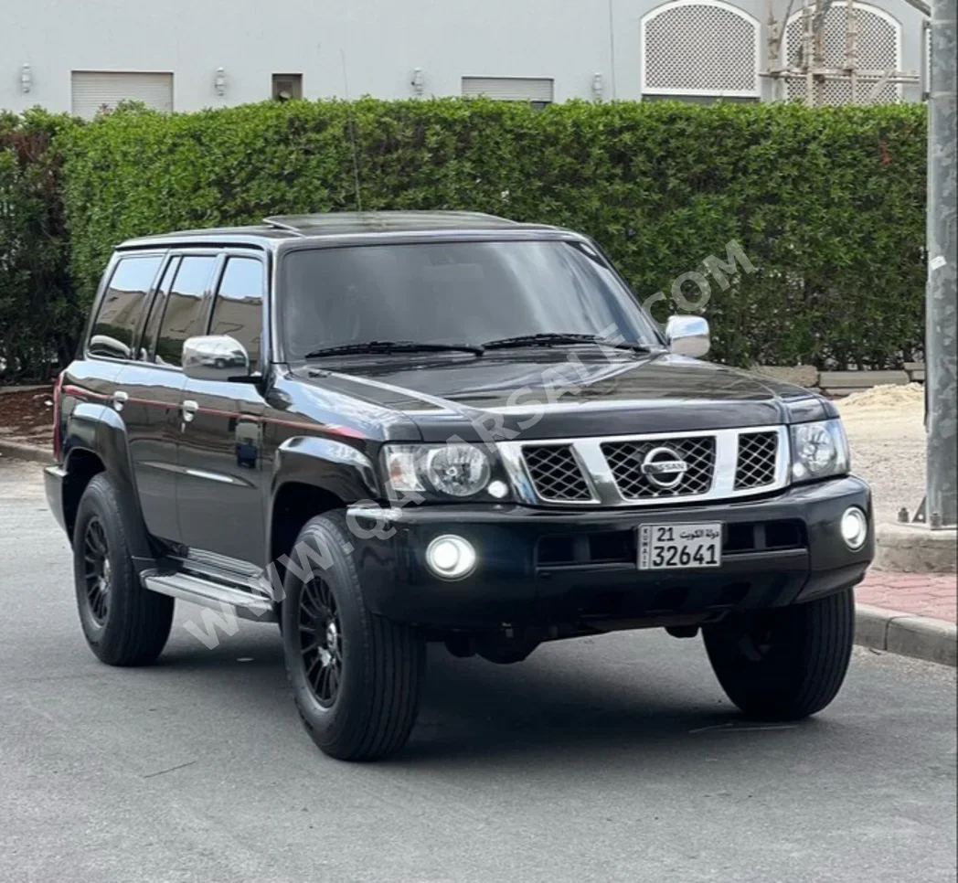 Nissan  Patrol  Safari  2021  Manual  121 Km  6 Cylinder  Four Wheel Drive (4WD)  SUV  Black