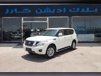 Nissan  Patrol  SE  2015  Automatic  230,000 Km  8 Cylinder  Four Wheel Drive (4WD)  SUV  White