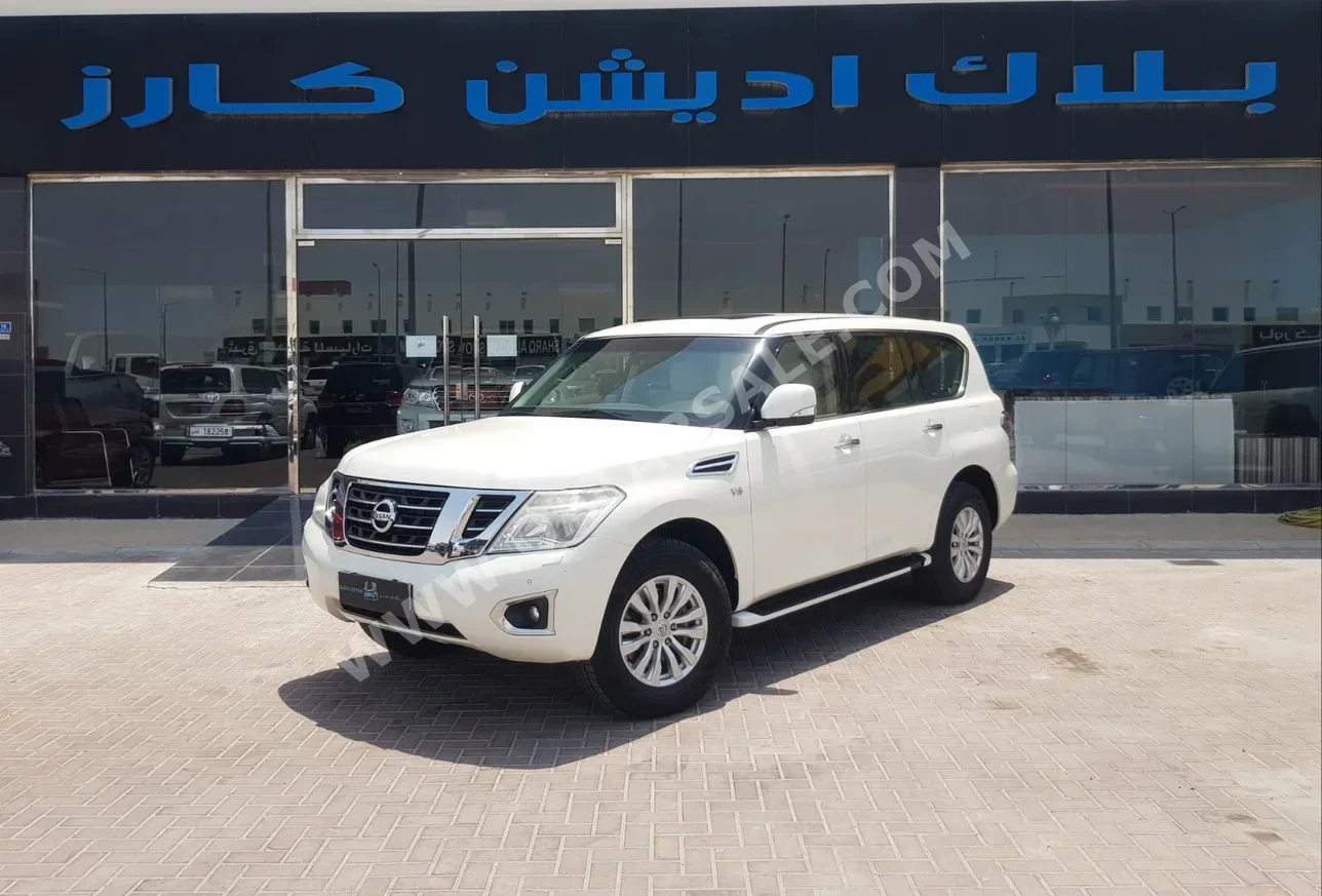 Nissan  Patrol  SE  2015  Automatic  230,000 Km  8 Cylinder  Four Wheel Drive (4WD)  SUV  White