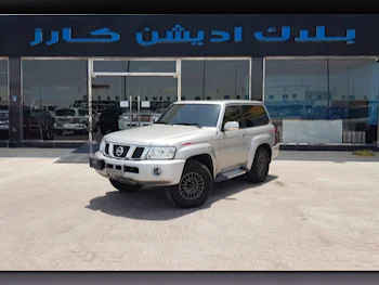 Nissan  Patrol  Safari  2014  Automatic  303٬000 Km  6 Cylinder  Four Wheel Drive (4WD)  SUV  Silver