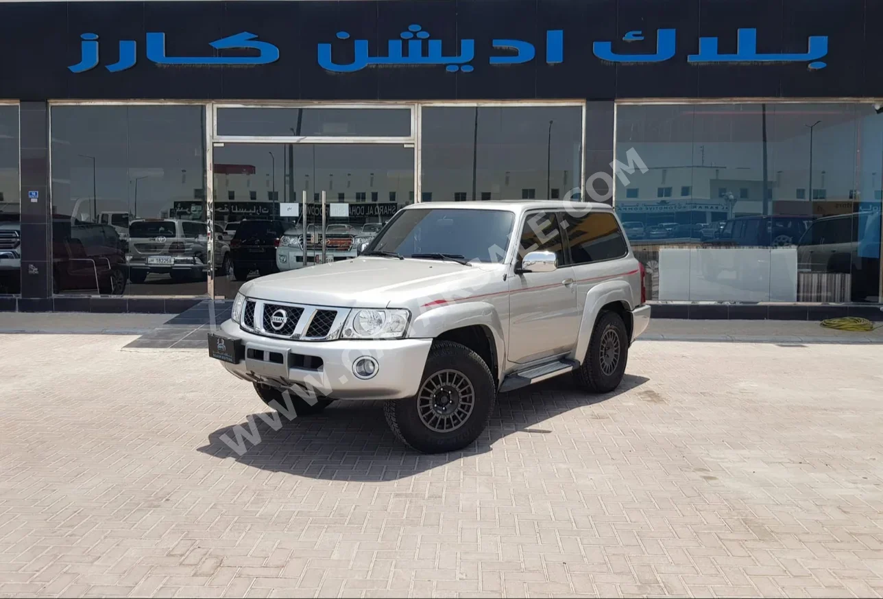 Nissan  Patrol  Safari  2014  Automatic  303٬000 Km  6 Cylinder  Four Wheel Drive (4WD)  SUV  Silver