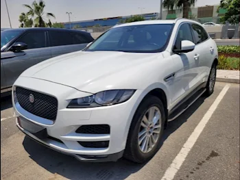 Jaguar  F-Pace  2018  Automatic  154٬359 Km  4 Cylinder  Four Wheel Drive (4WD)  SUV  White