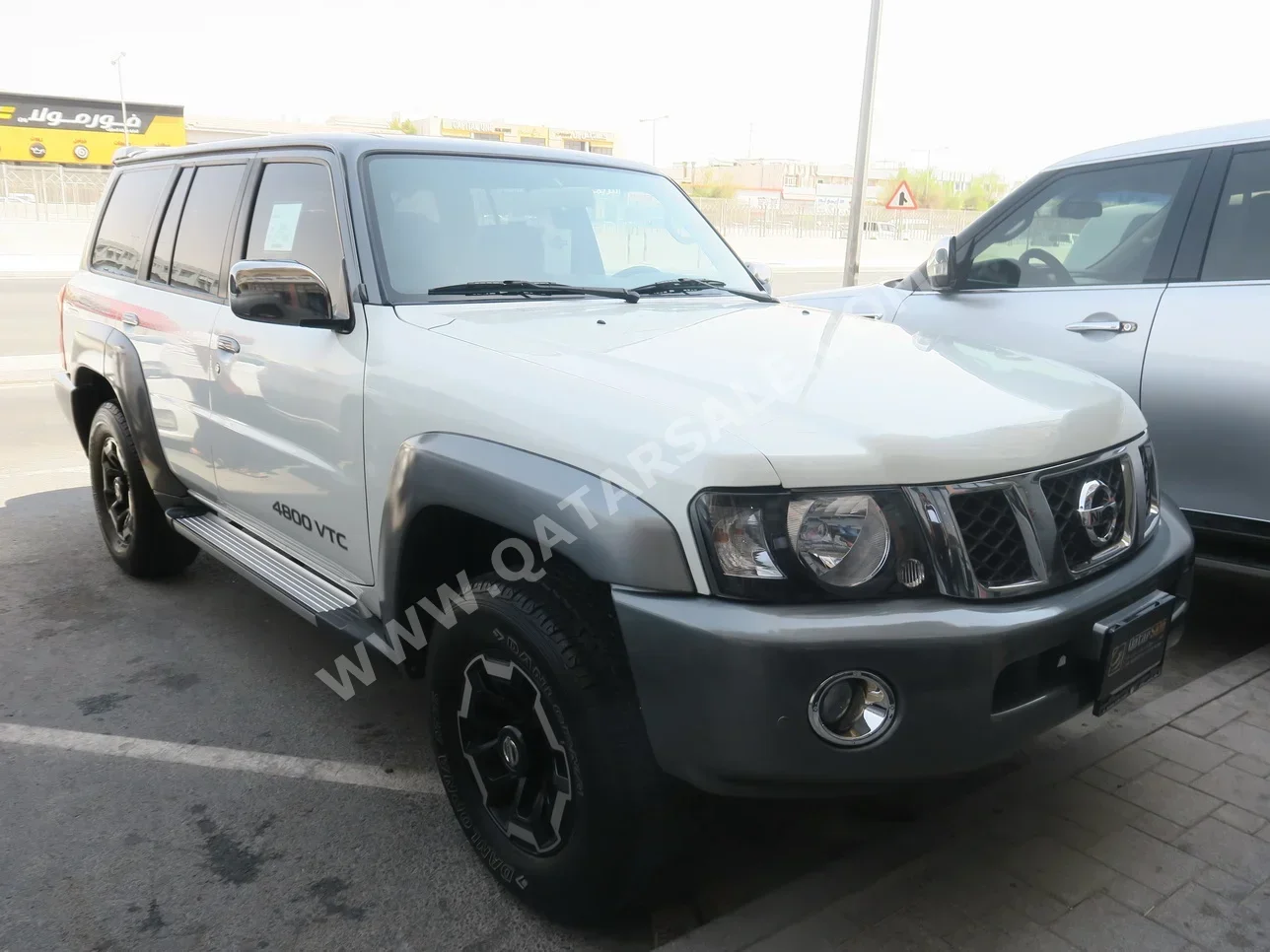 Nissan  Patrol  Super Safari  2021  Manual  80٬000 Km  6 Cylinder  Four Wheel Drive (4WD)  SUV  White  With Warranty