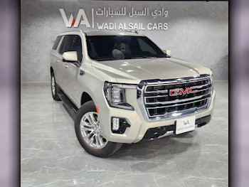 GMC  Yukon  XL  2024  Automatic  4,065 Km  8 Cylinder  Four Wheel Drive (4WD)  SUV  Gold  With Warranty