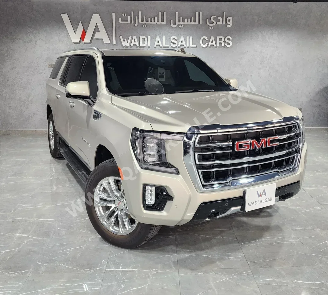 GMC  Yukon  XL  2024  Automatic  4,065 Km  8 Cylinder  Four Wheel Drive (4WD)  SUV  Gold  With Warranty