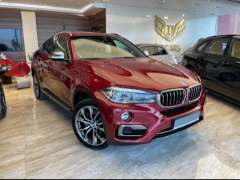 BMW  X-Series  X6 50i  2015  Automatic  111٬000 Km  8 Cylinder  All Wheel Drive (AWD)  SUV  Maroon