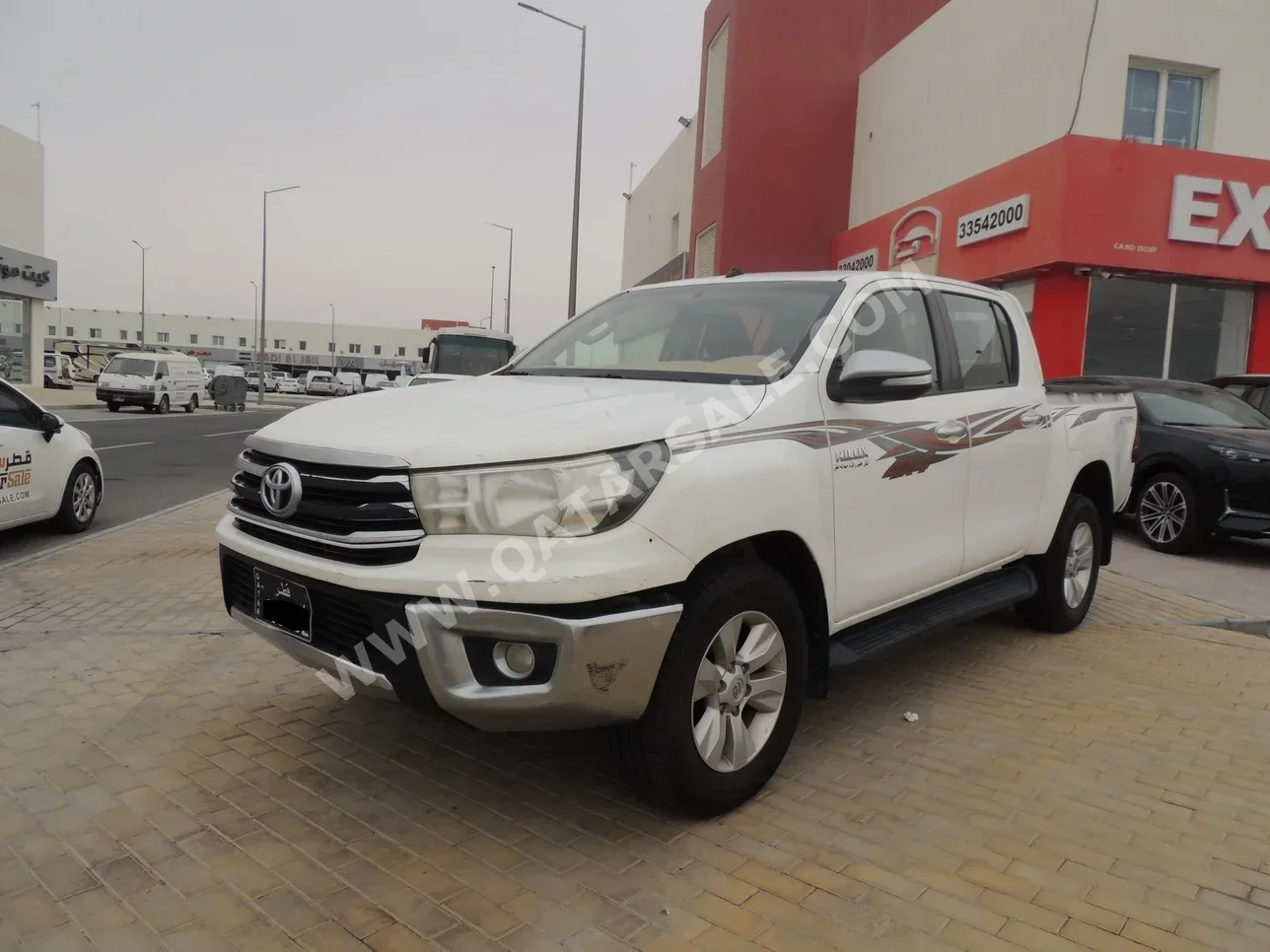 Toyota  Hilux  SR5  2016  Automatic  319,000 Km  4 Cylinder  Four Wheel Drive (4WD)  Pick Up  White