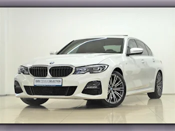 BMW  3-Series  320i  2021  Automatic  32,100 Km  4 Cylinder  Rear Wheel Drive (RWD)  Sedan  White  With Warranty