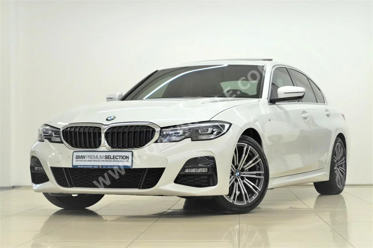 BMW  3-Series  320i  2021  Automatic  32,100 Km  4 Cylinder  Rear Wheel Drive (RWD)  Sedan  White  With Warranty