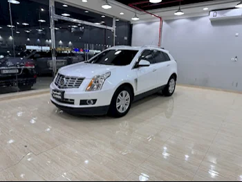 Cadillac  SRX  4  2016  Automatic  129,000 Km  6 Cylinder  Four Wheel Drive (4WD)  SUV  White