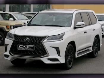 Lexus  LX  570 S Black Edition  2019  Automatic  165,000 Km  8 Cylinder  Four Wheel Drive (4WD)  SUV  White