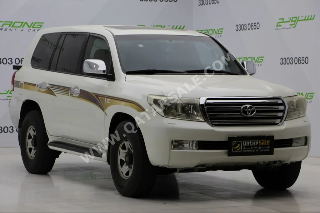  Toyota  Land Cruiser  GXR  2010  Automatic  480,000 Km  8 Cylinder  Four Wheel Drive (4WD)  SUV  Pearl  With Warranty