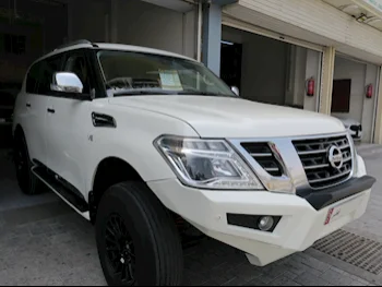 Nissan  Patrol  Platinum  2014  Automatic  274,000 Km  8 Cylinder  Four Wheel Drive (4WD)  SUV  White