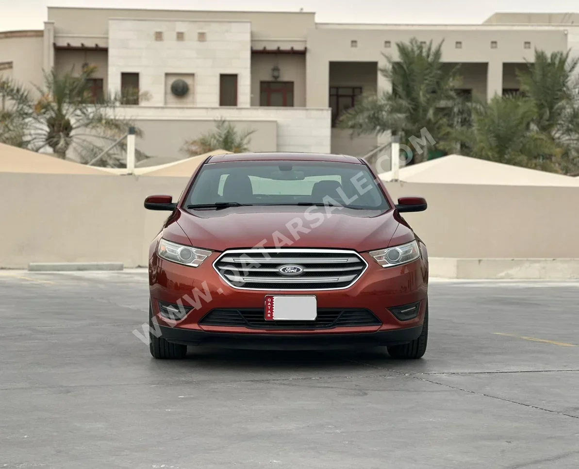 Ford  Taurus  2014  Automatic  99,000 Km  6 Cylinder  Rear Wheel Drive (RWD)  Sedan  Red