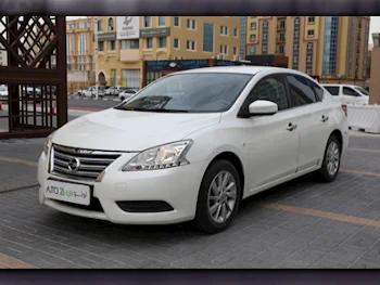 Nissan  Sentra  2017  Automatic  81,400 Km  4 Cylinder  Front Wheel Drive (FWD)  Sedan  White