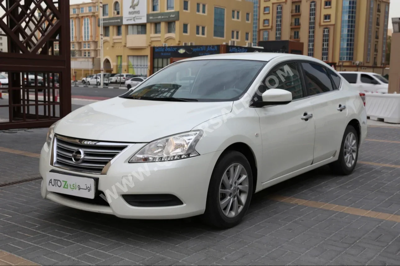 Nissan  Sentra  2017  Automatic  81,400 Km  4 Cylinder  Front Wheel Drive (FWD)  Sedan  White