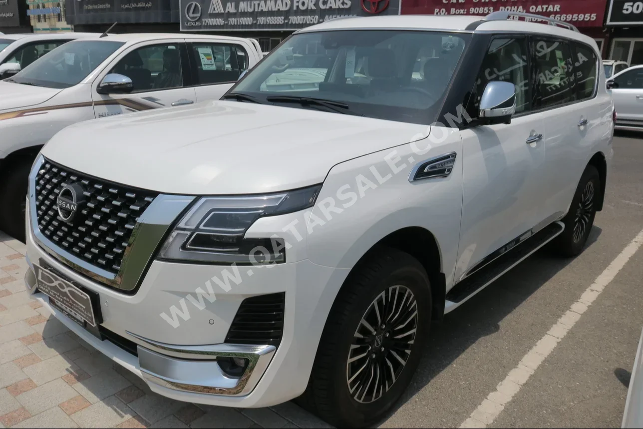 Nissan  Patrol  Platinum  2023  Automatic  0 Km  6 Cylinder  Four Wheel Drive (4WD)  SUV  White  With Warranty