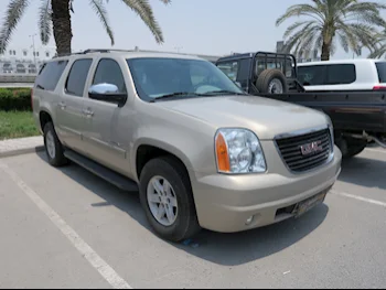 GMC  Yukon  XL  2012  Automatic  342,000 Km  8 Cylinder  Four Wheel Drive (4WD)  SUV  Gold