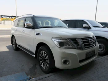 Nissan  Patrol  SE  2014  Automatic  310,000 Km  8 Cylinder  Four Wheel Drive (4WD)  SUV  White