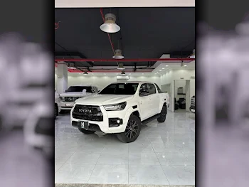 Toyota  Hilux  GR Sport  2023  Automatic  24,000 Km  6 Cylinder  Four Wheel Drive (4WD)  Pick Up  White  With Warranty