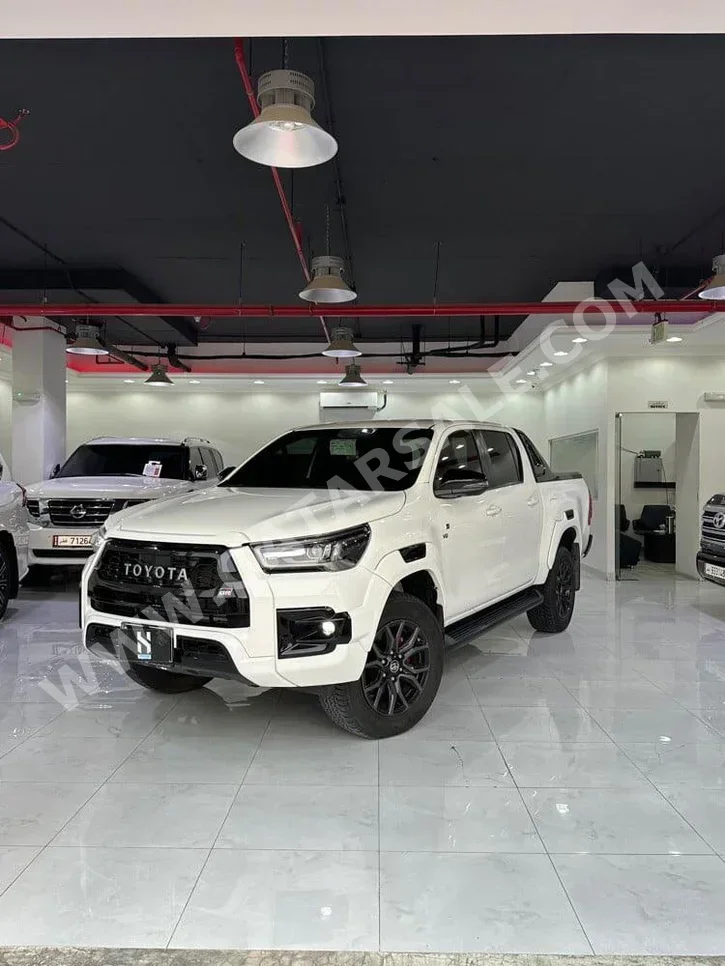 Toyota  Hilux  GR Sport  2023  Automatic  24,000 Km  6 Cylinder  Four Wheel Drive (4WD)  Pick Up  White  With Warranty