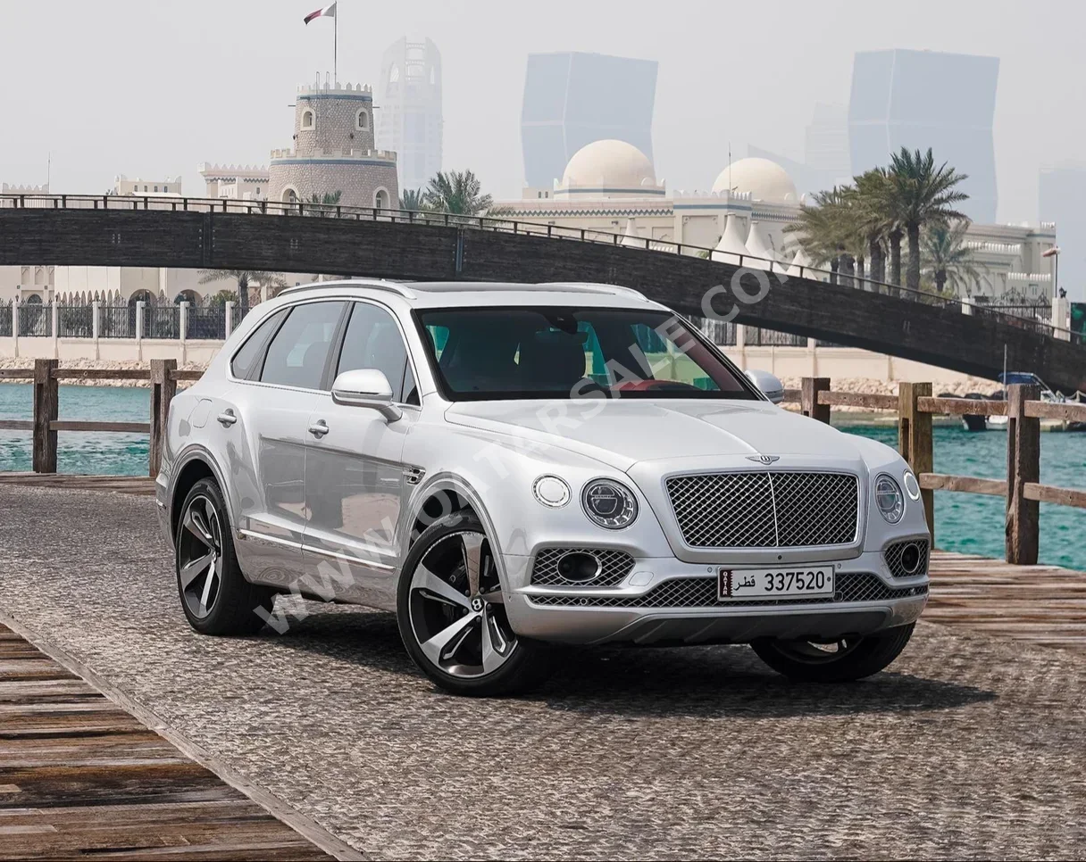 Bentley  Bentayga  2019  Automatic  34,000 Km  12 Cylinder  Four Wheel Drive (4WD)  SUV  Silver  With Warranty