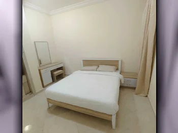 2 Bedrooms  Apartment  For Rent  in Doha -  Al Mansoura  Fully Furnished