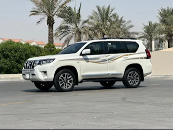 Toyota  Prado  TXL  2022  Automatic  66,000 Km  6 Cylinder  Four Wheel Drive (4WD)  SUV  White  With Warranty