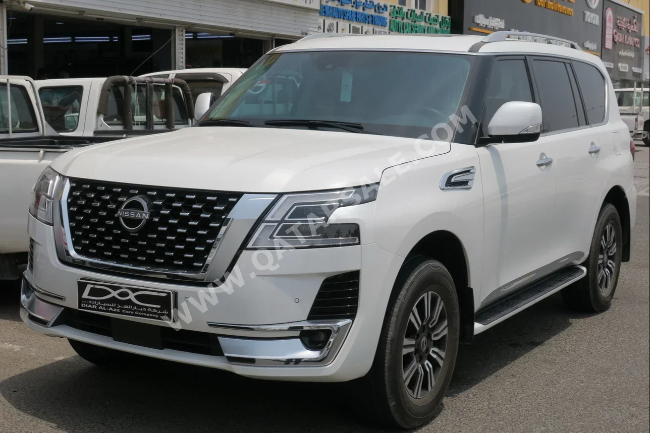 Nissan  Patrol  Titanium  2023  Automatic  32,000 Km  6 Cylinder  Four Wheel Drive (4WD)  SUV  White  With Warranty