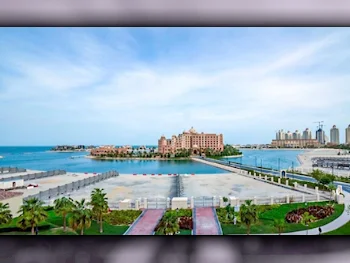 3 Bedrooms  Apartment  For Sale  in Doha -  The Pearl  Semi Furnished